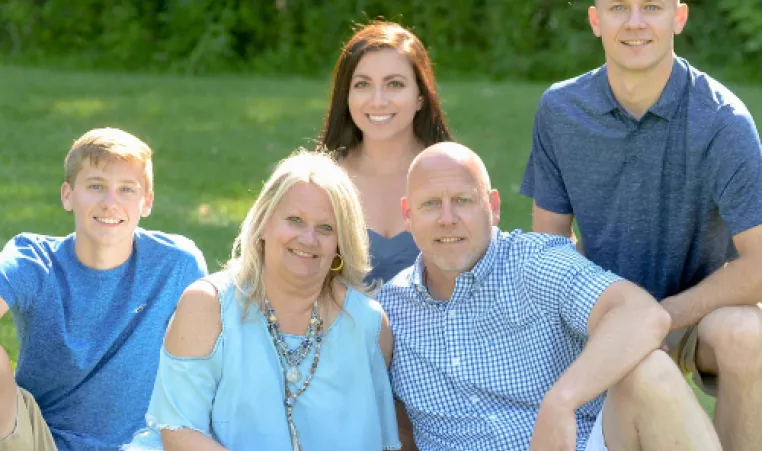 Holly Butenhoff and family pose for a portrait