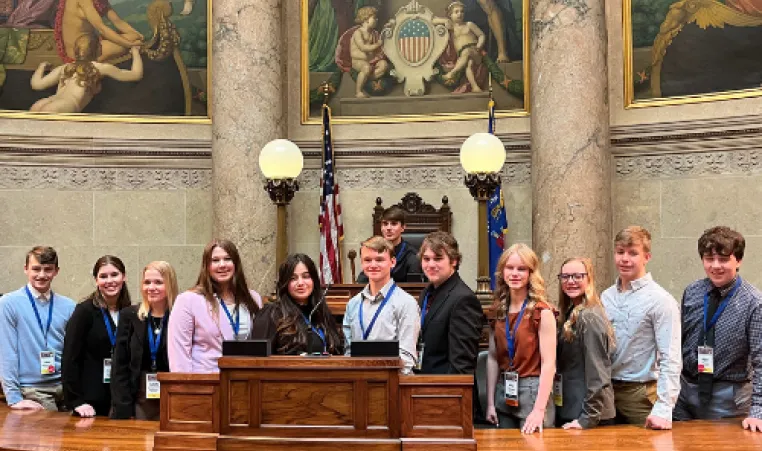 Members of the Door County Y Youth In Government program gather for portrait in the chambers at the Capitol in Madison.