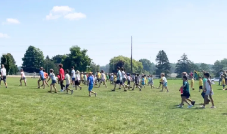 Kids Playing Red Light Green Light in field