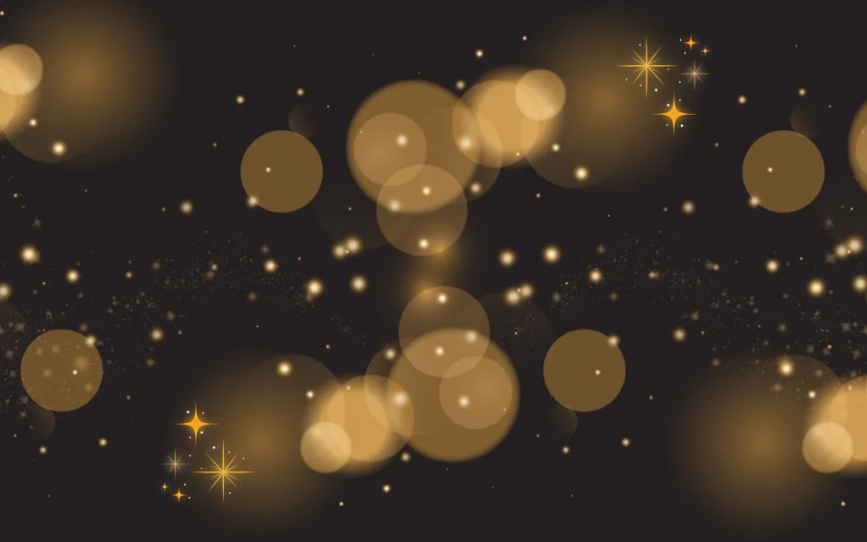 Gold circles and starbursts of varying sizes on a black background